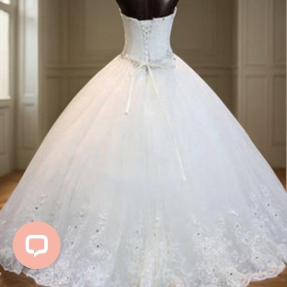 Elegant White Strapless Wedding Dress - Picture 2 of 4